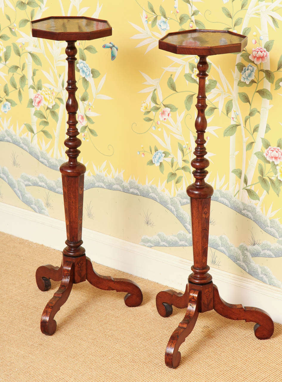 Fine Pair of William & Mary Period Walnut Torcheres, the lipped octagonal tops with inlaid marquetry in various woods and engraved bone floral sprays above turned balusters resting on inlaid octagonal supports and scrolled hipped cabriole legs. 