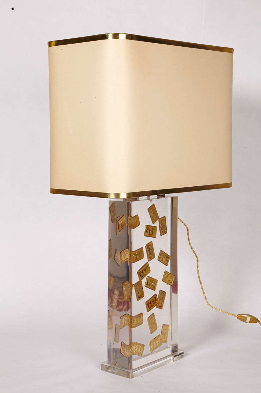 1980s table lamp with inclusions.
No shade provided.
Dimensions are given without shade.