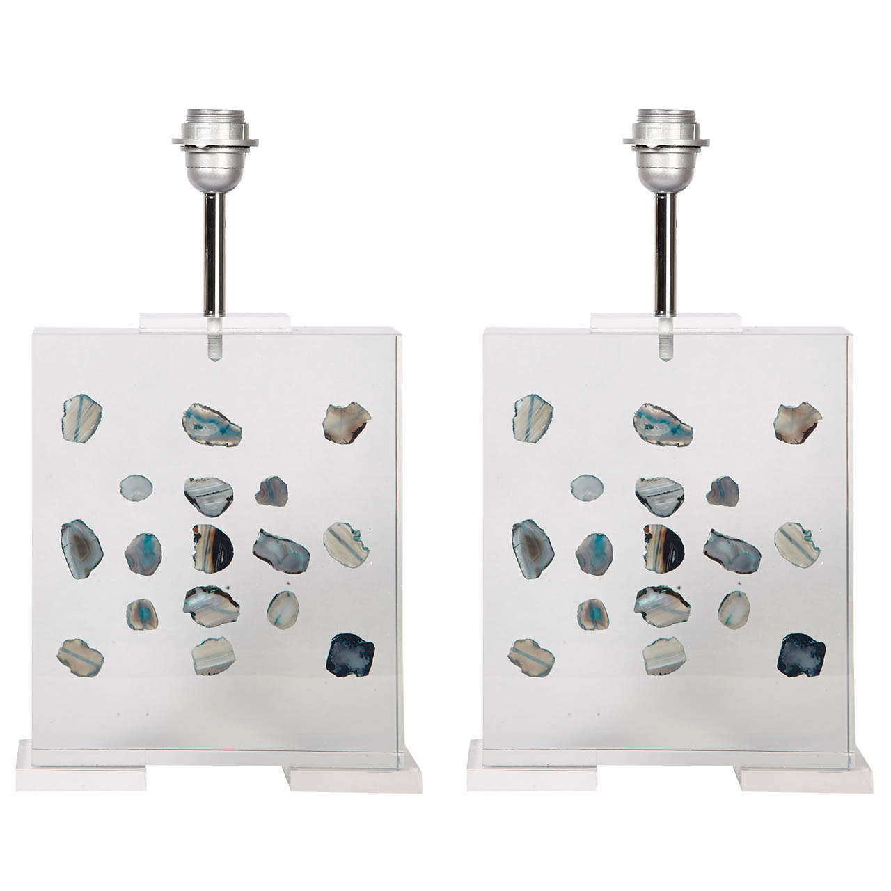 Fantastic pair of lamps in lucite with inclusion of small blue agates