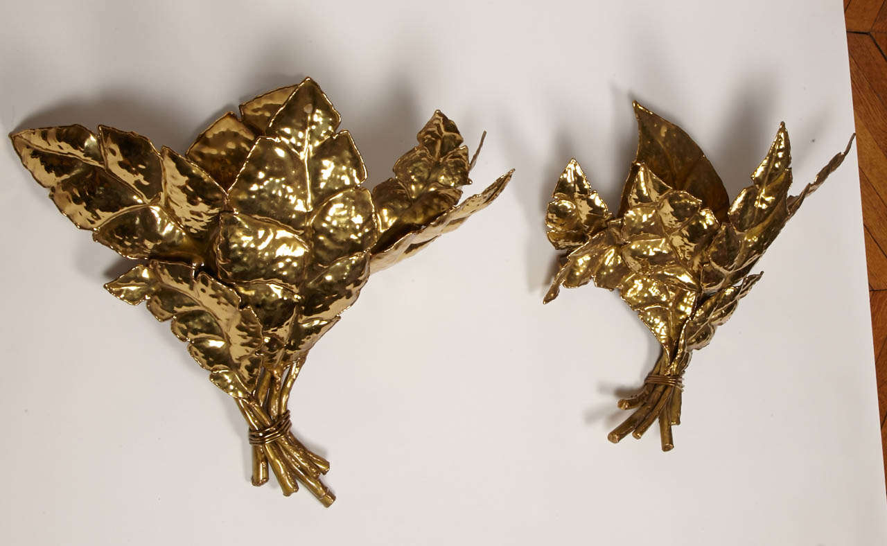 Great pair of brass leaf sconces signed by an employee of Jacques Duval-Brasseur.