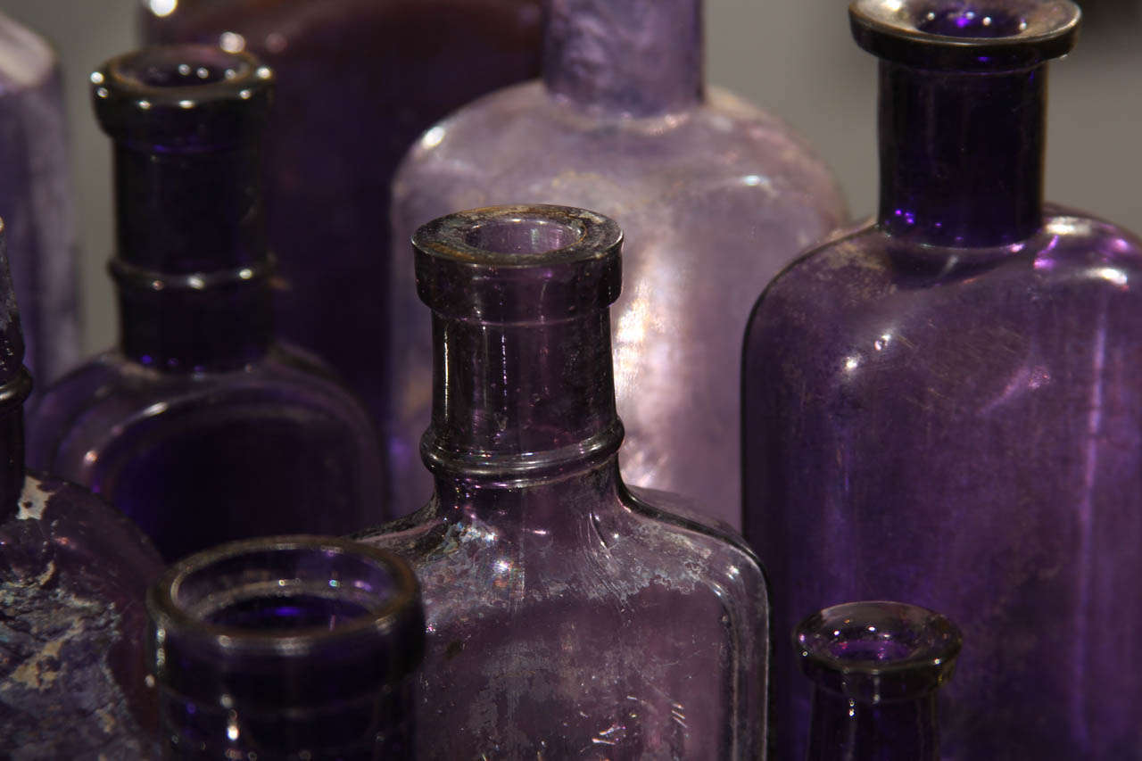 Group of Nine Purple Bottles In Distressed Condition In Seattle, WA