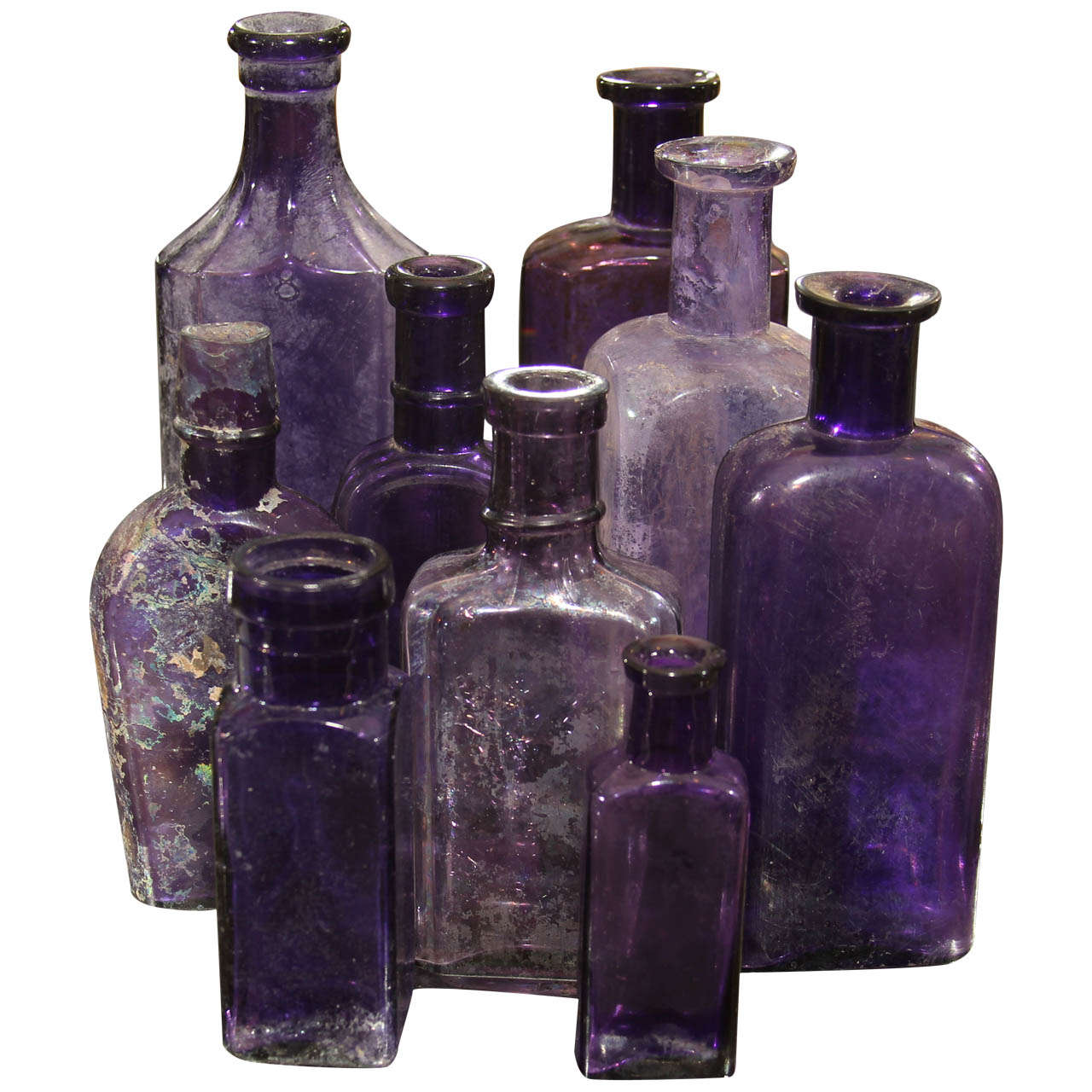 Group of Nine Purple Bottles