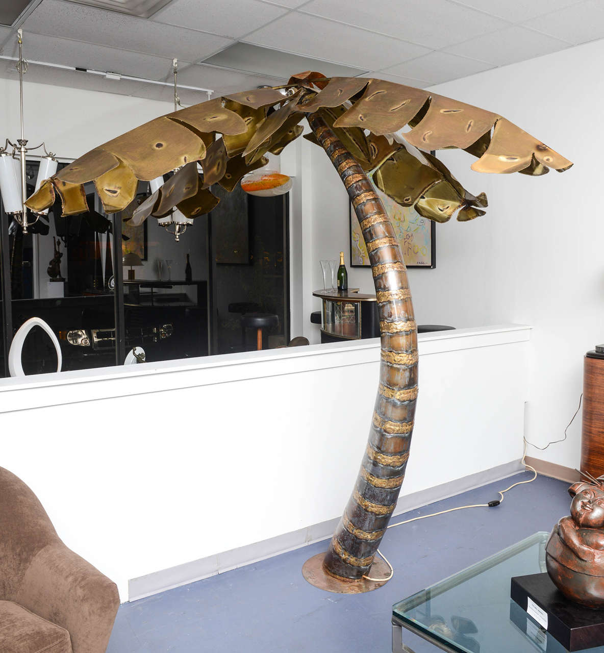 Life size banana tree in copper leaves , sculptural  Floor Lamp ,in the exact style of Duval Brasseur.
4 spotlights or normal lights in the upper part of the trunk,under the leaves.
Very interesting design , the craftsmanshift is perfect on the