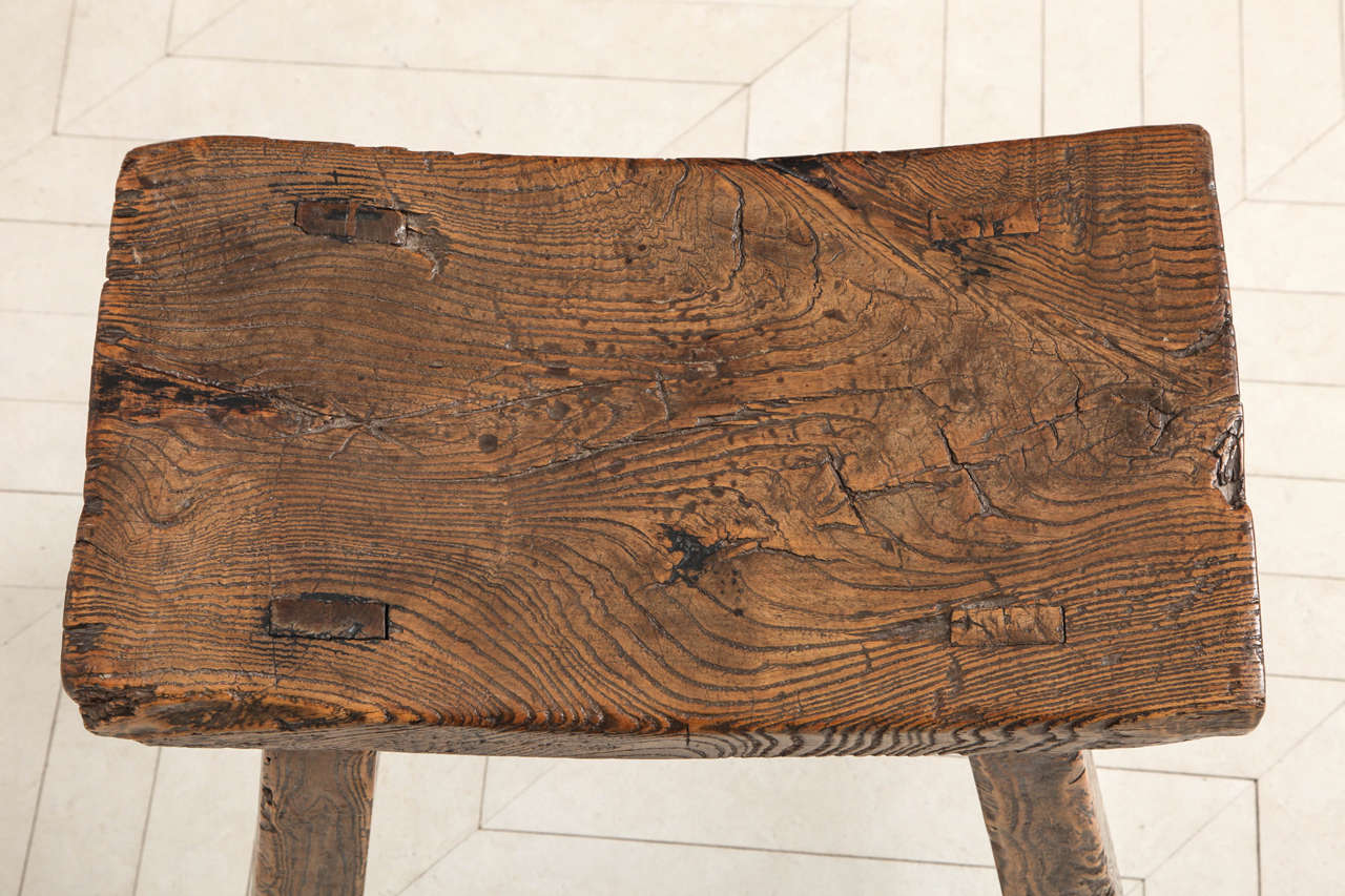 Wood A 19th century Chinese elm wood stool