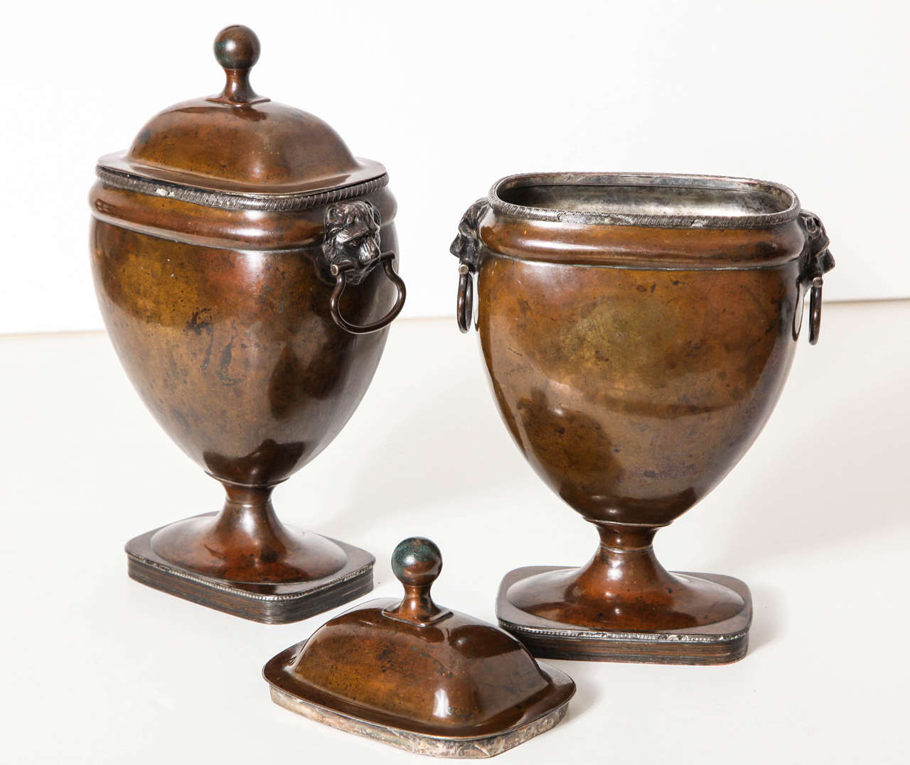 A Pair of 19th century English silvered copper covered urns 2