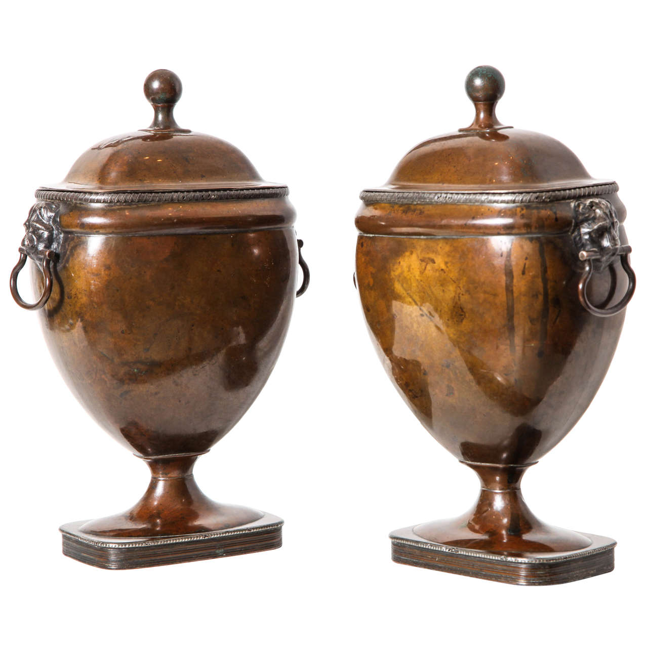 A Pair of 19th century English silvered copper covered urns