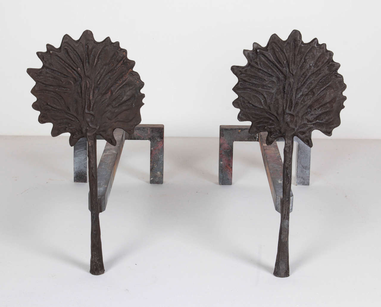 After Diego Giacometti, Circa 1990 
Pair of Tree Andirons in Cast Bronze and Iron
