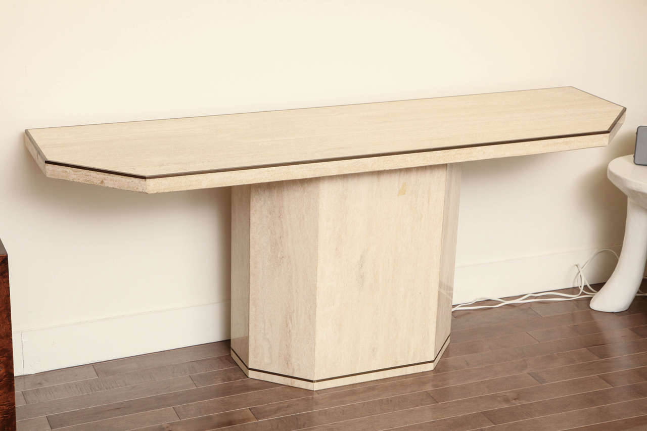 Italian travertine console with brass details, circa 1970s.