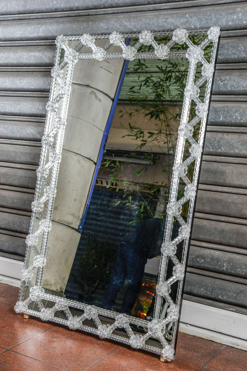 Venetian mirror with border in Murano glass.