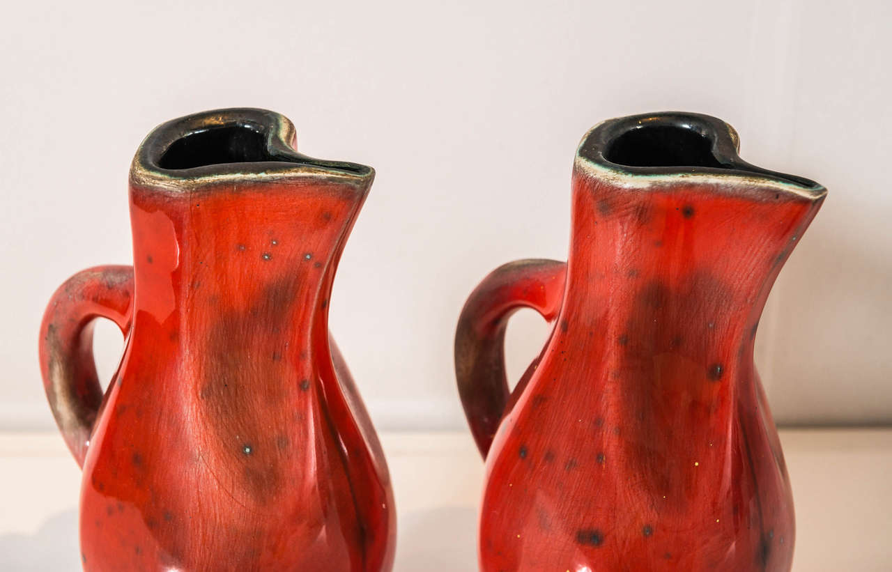French Georges JOUVE Pair Of Red Ceramic Pitchers For Sale