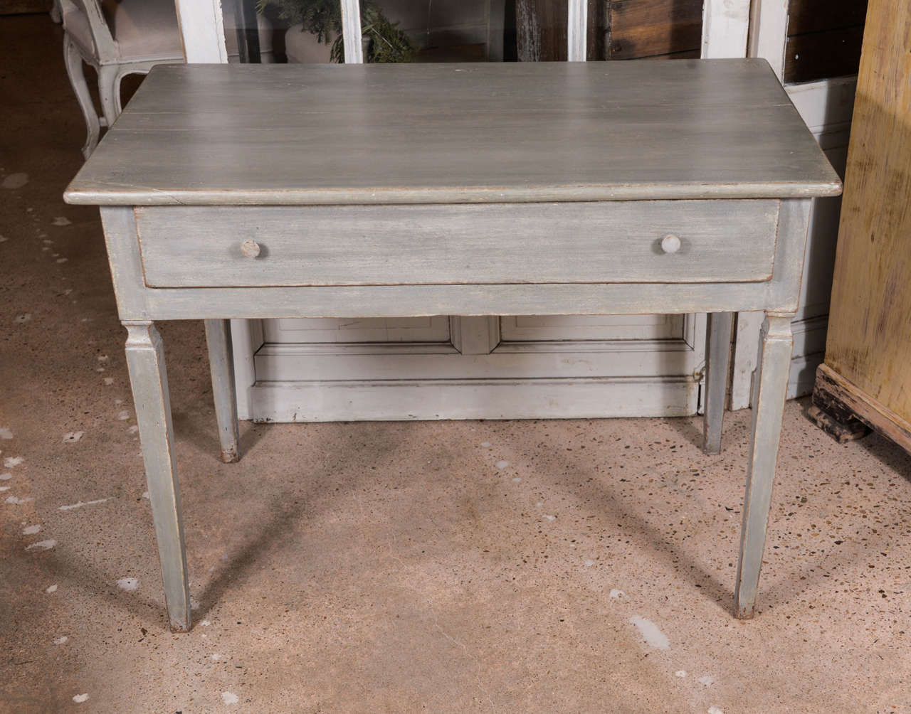 Walnut single drawer table (transitional Louis XV/XVI) with later paint, from Northern Italy.