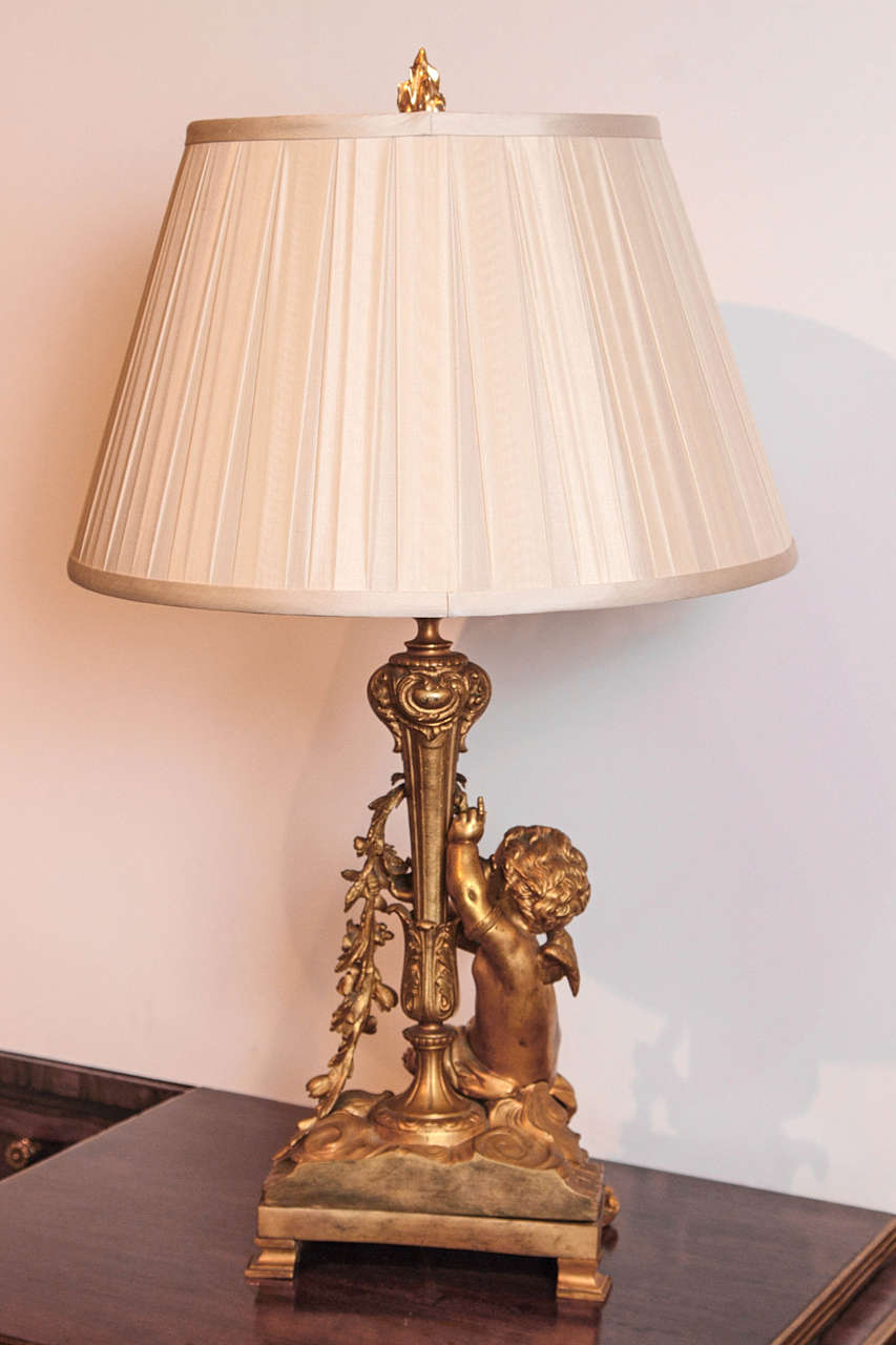 Louis Philippe 19th century  French gilt cherub lamps