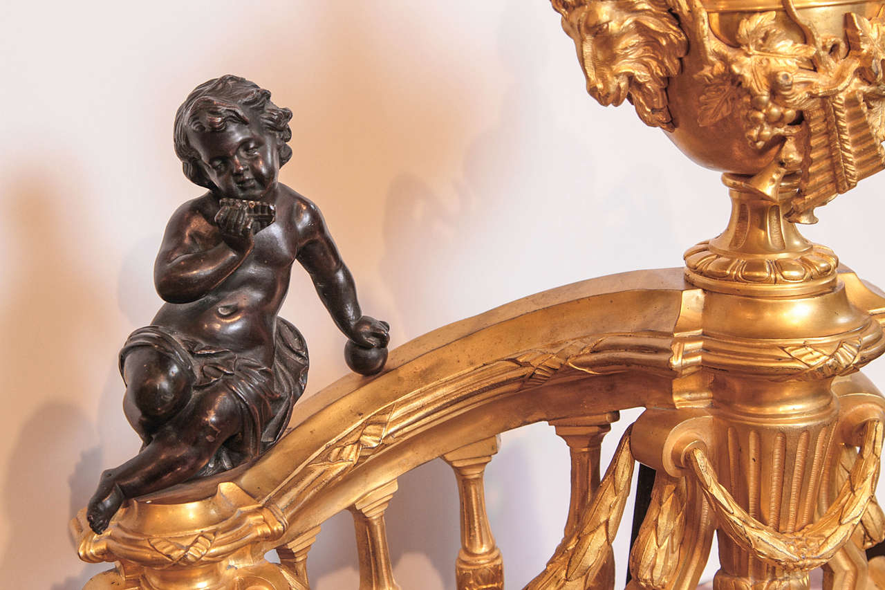 European 19th century French gilt bronze cherub chenets