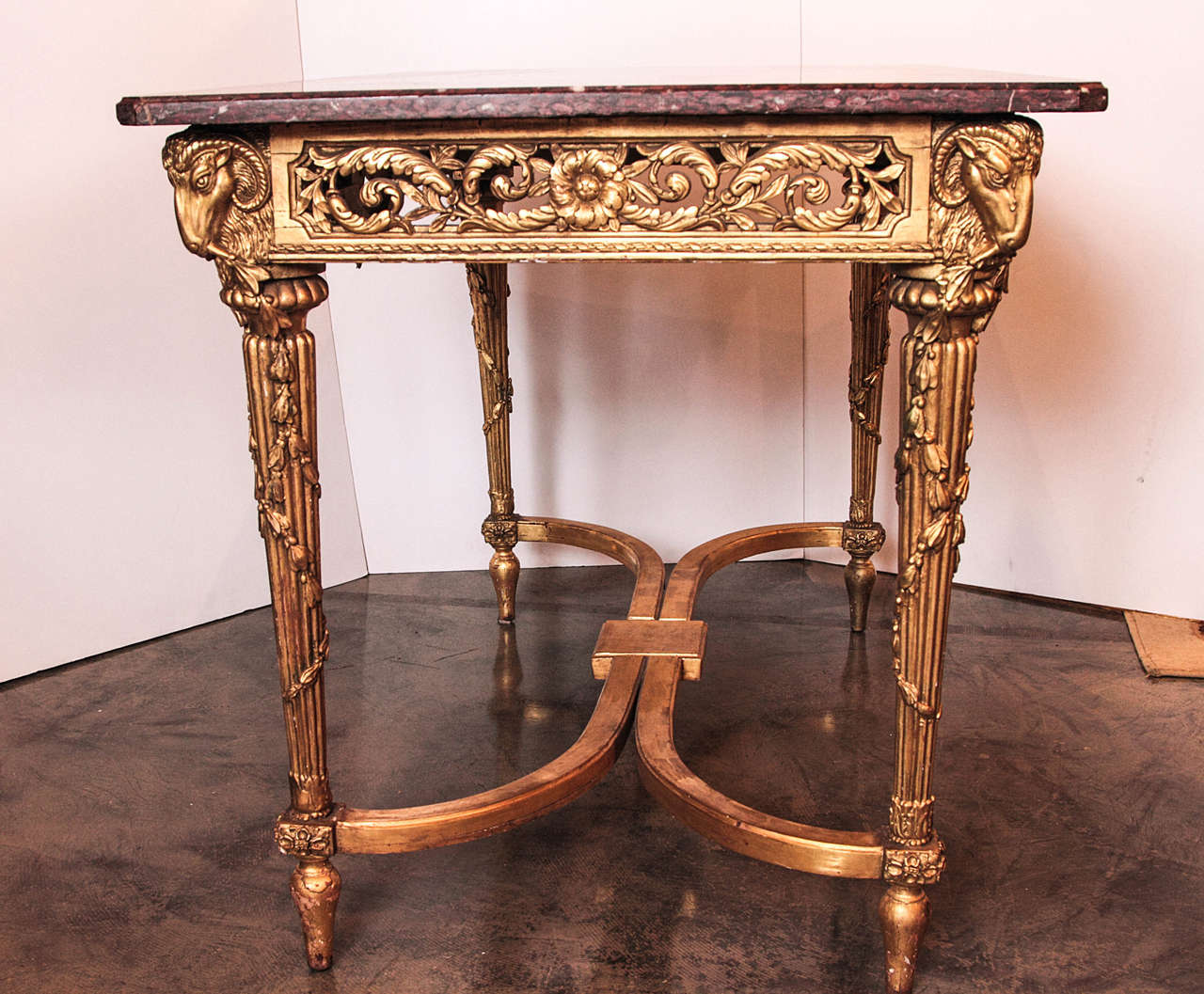 19th century French Louis XVI gilded marble top center table/console In Excellent Condition In Dallas, TX