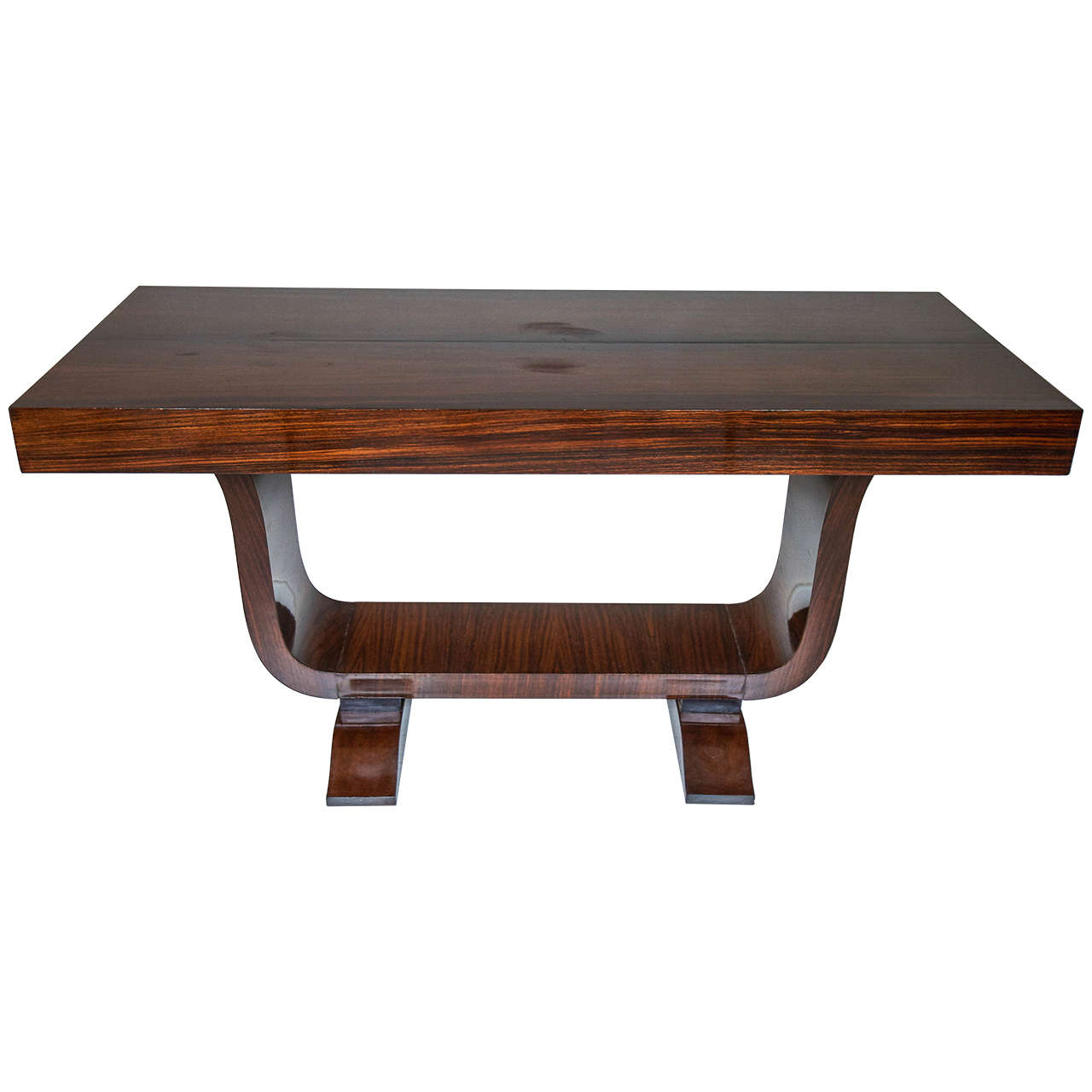 Beautiful rosewood console table, finished on both the sides, can be put on the center of the room or used like a desk.
Two moustache bases sustains a curved bend.
