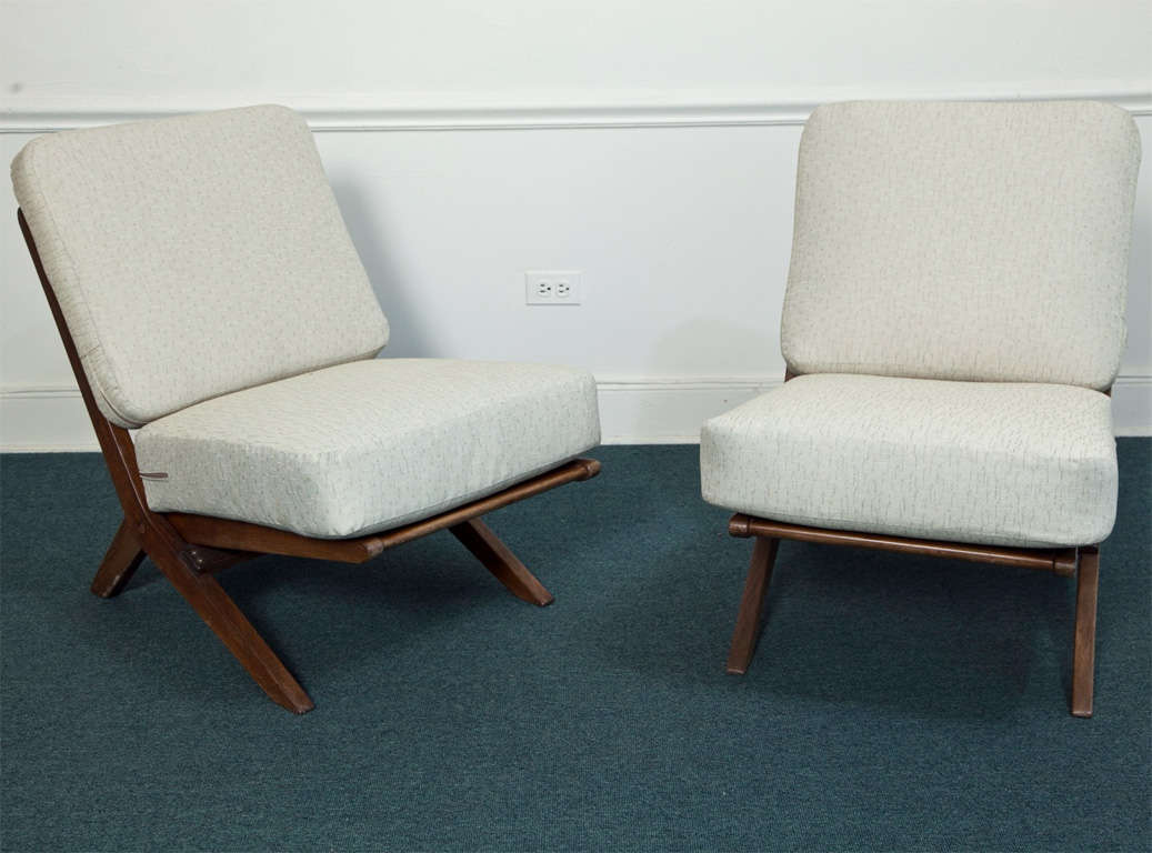 Original walnut frame chairs with sprung pillow upholstery.  In the style of Robert Mallet Stevens.  Original fabric slats on both seat and back.  Chair does not fold.