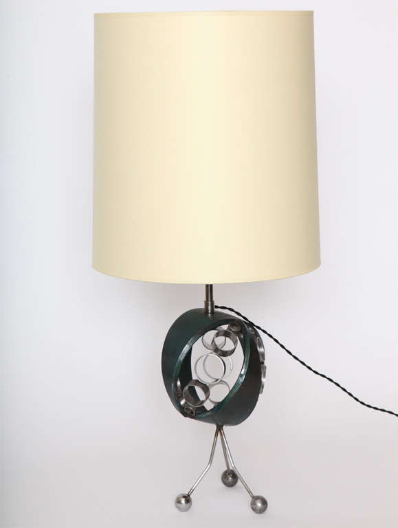 A 1970s sculptural futuristic table lamp handcrafted of iron
New sockets and rewired
Shade not included