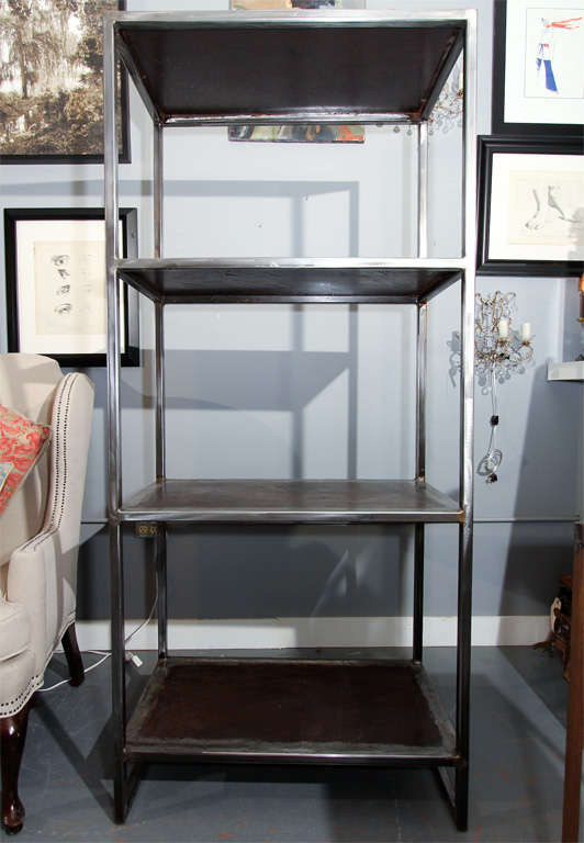 Handsome steel shelf blending raw polished steel with rusted and pitted steel plates salvaged from marine vessel. Super sturdy, very versatile. Beautiful in any room in the house, great for retail display.