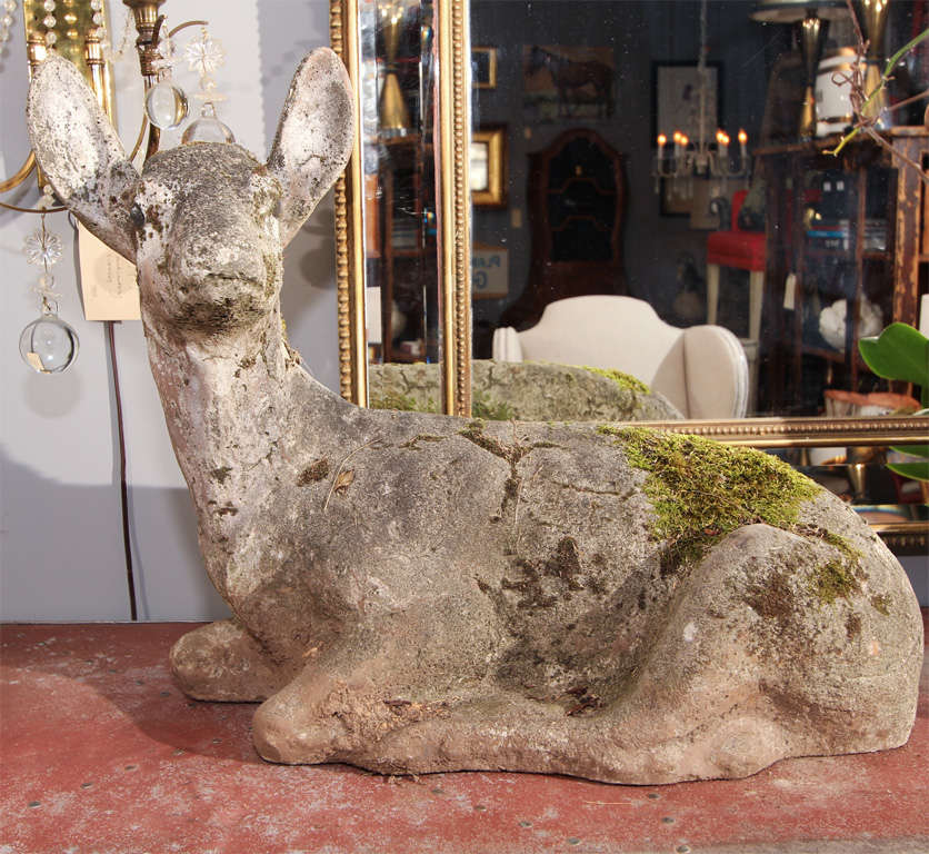 beautiful patina with moss.  lovely as indoor sculpture or outdoors as originally intended