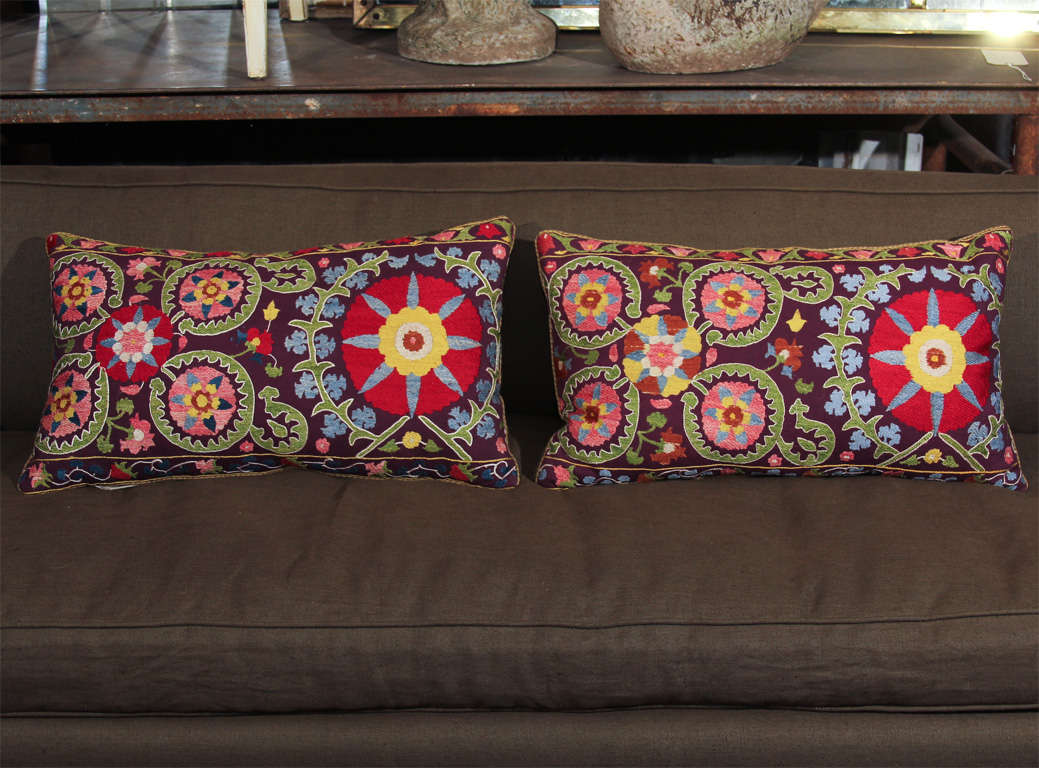 stunning pair of purple suzani pillows