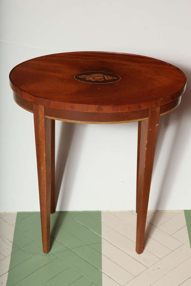 VIntage Baker Furniture drinks table with inlaid shell motif and banding along bottom edge. Table has Baker plaque on underside.