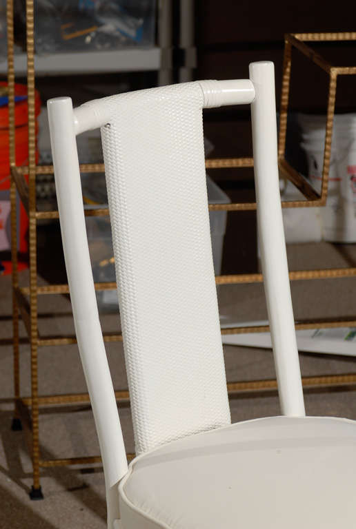 * Vintage dining chair
* Rattan frame
* Basket weave back panel
* Newly upholstered in white velvet fabric goods
* Painted in white semi gloss finish
* Custom box seat cushion