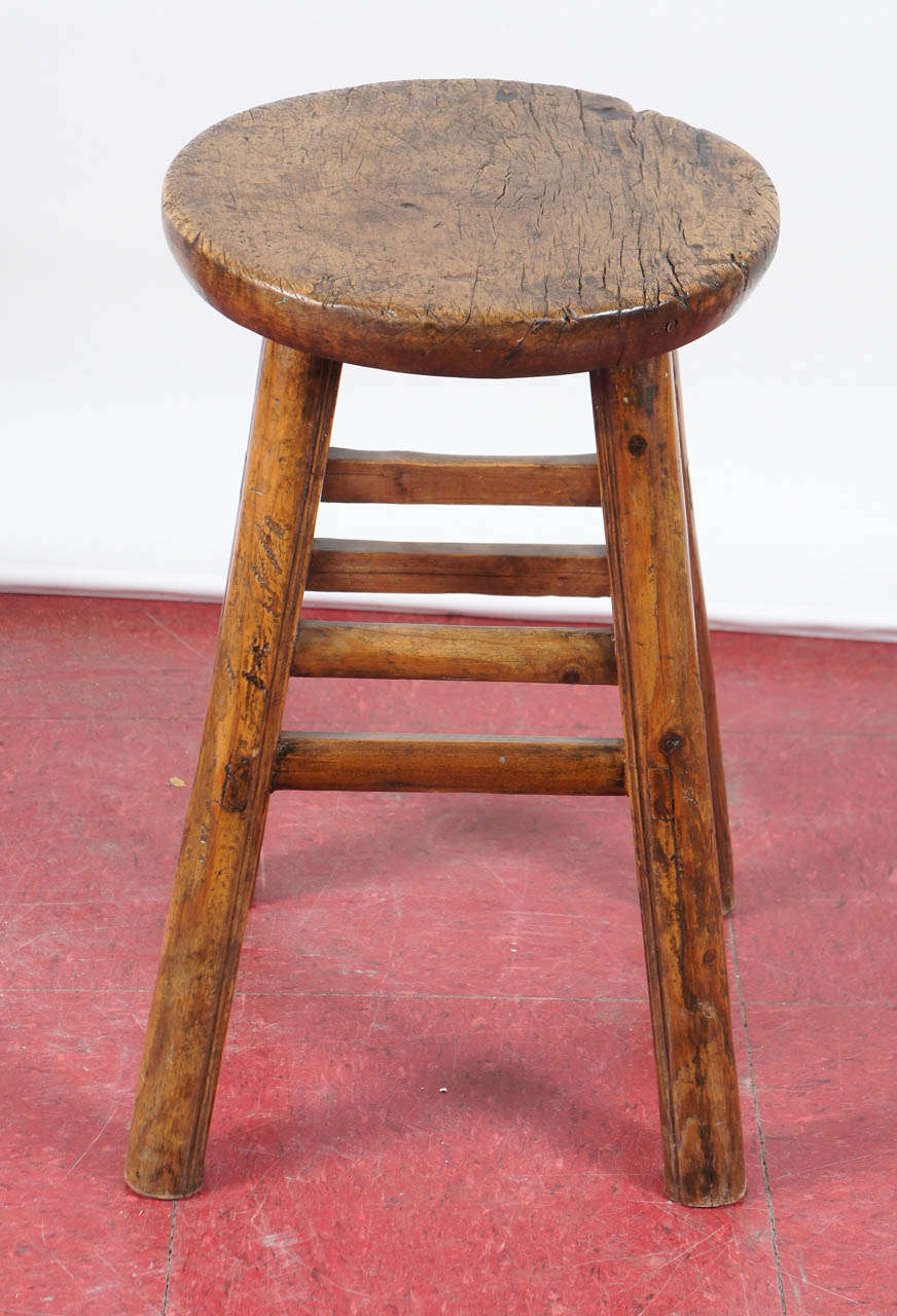 This can be a stool, side table, or occasional table.  It can easily be used as needed for a last minute chair at a dining table.  it is well made with slotted and pegged construction and eight stretchers, great patina.

Seat: 12