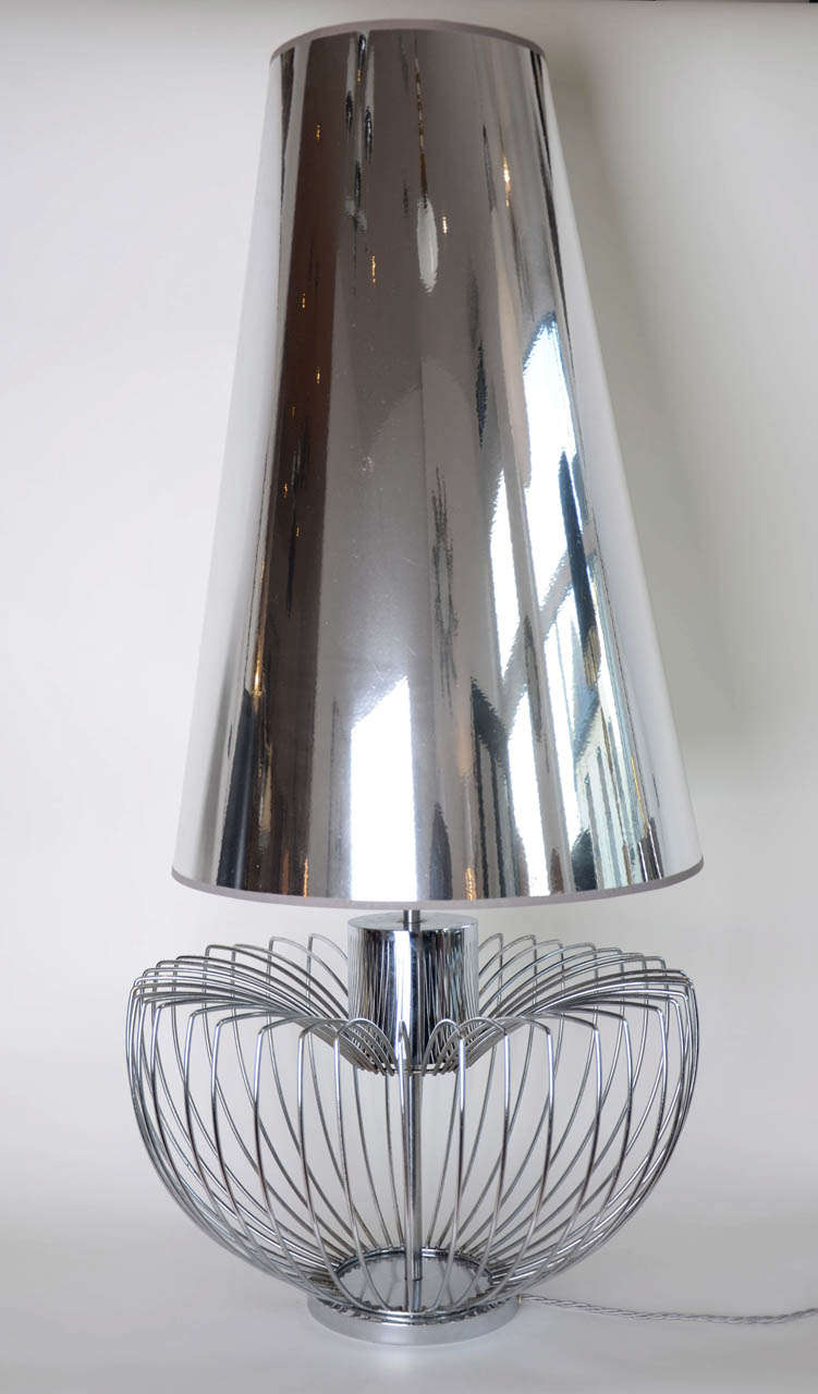attributed to Max Sauze, this chromed metal spider lamp can be perceived as a sculptural piece in an interior skim.