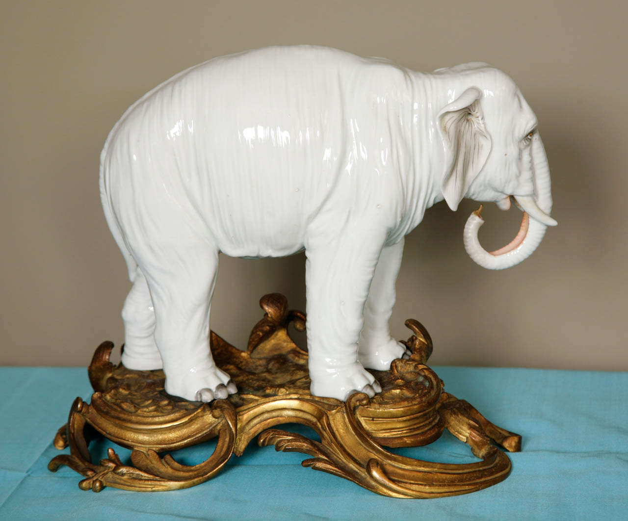 19th Century A Large Porcelain Elephant in a Gilt Rococo Ormolu Base