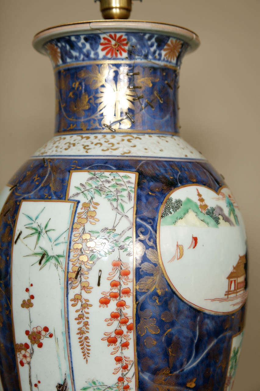 Porcelain A Large Lamped Japanese Early 18th Century Imari Elongated Vase