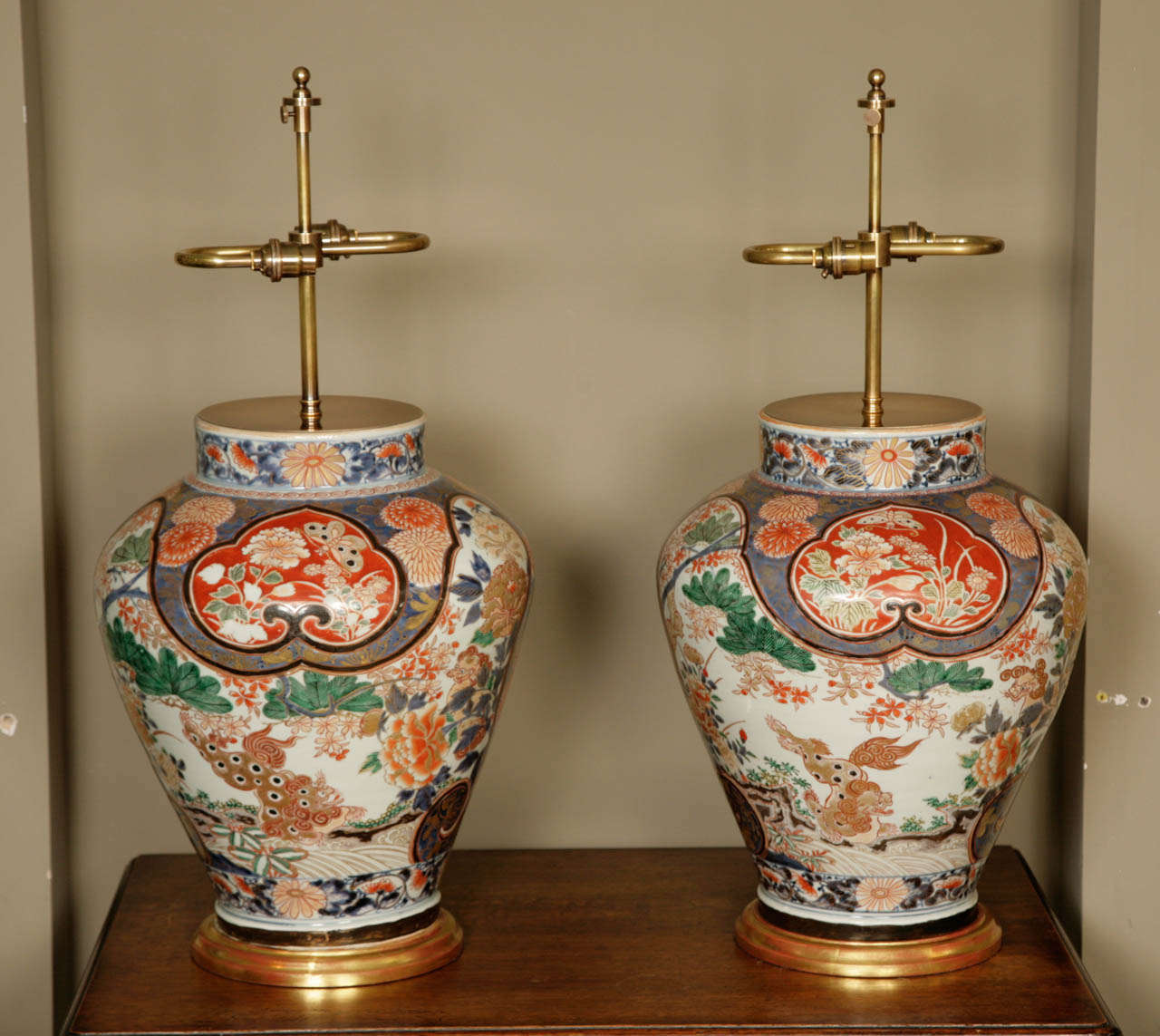17th Century Pair of Imari Baluster Vases on Giltwood Bases