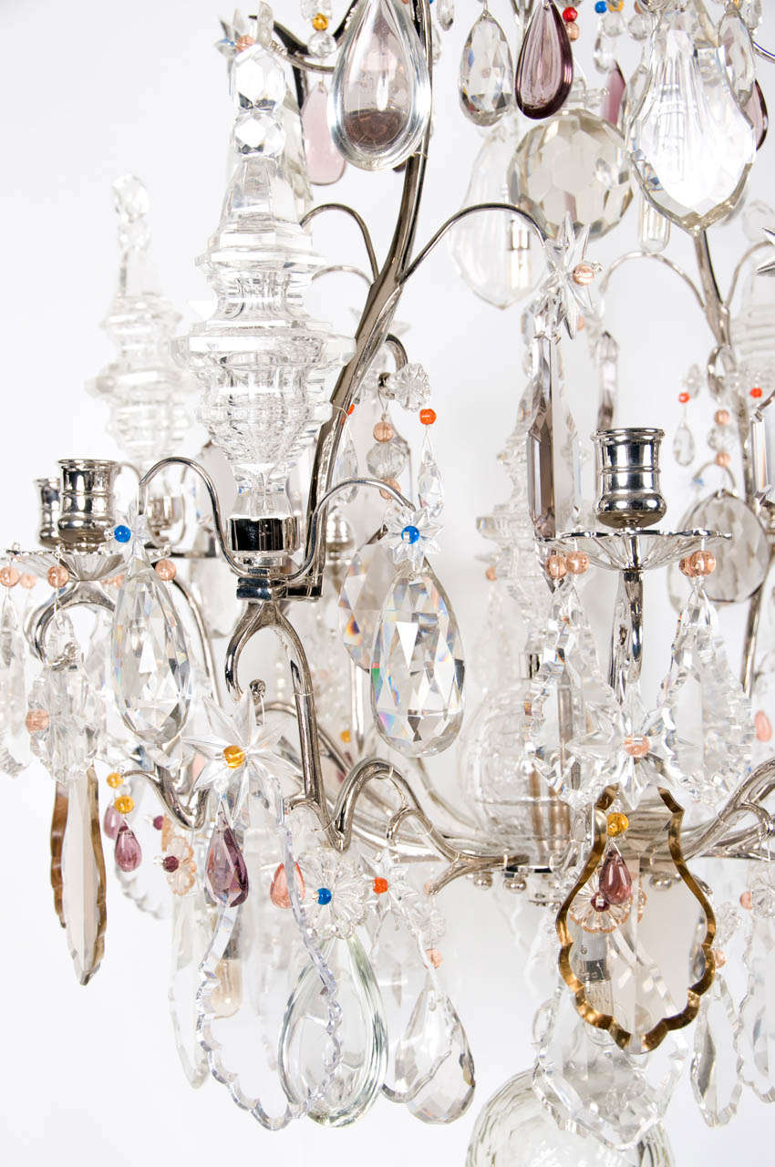 A Louis XV Style Silvered Bronze 8 Light Chandelier