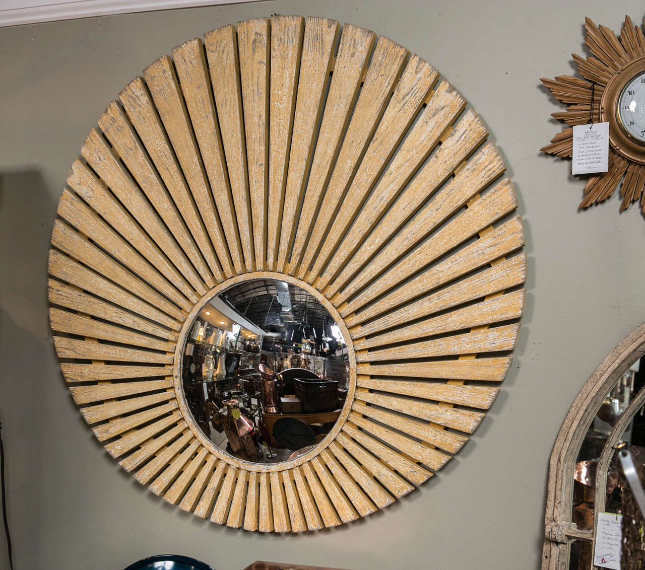 #038-15  
Sunrise ‘Belgium style’ Convex Mirror -Mirror on bottom, not in middle -Made from reclaimed pine by English artist in two tone yellow over white paint finish.
It is 48