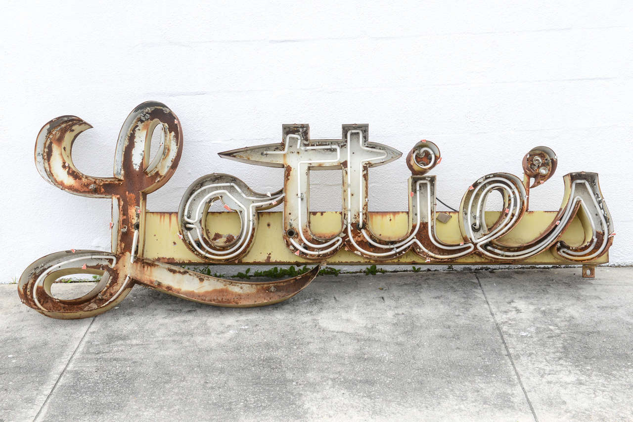 Great worn vintage neon sign advertising 