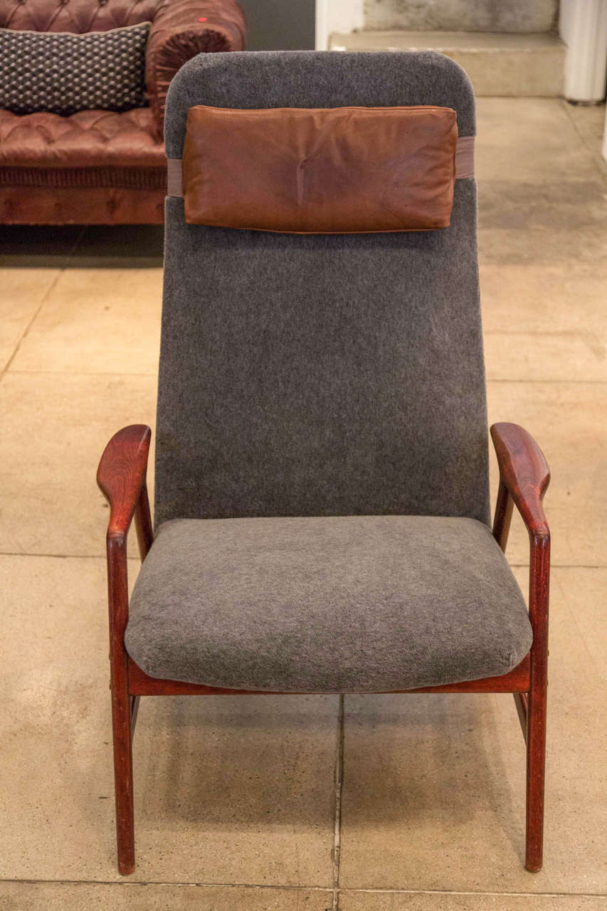 Alf Svensson's high back chair in gray alpaca with it's beautifully patinated 
dark cognac headrest.