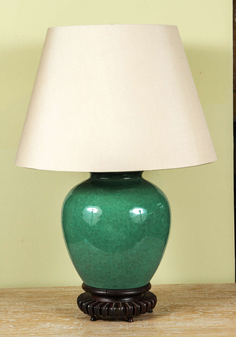 A Chinese Green Crackle Glazed Jar, c.1840 now
mounted as a Lamp with a Custom Silk Pongee Shade in Dark Natural.