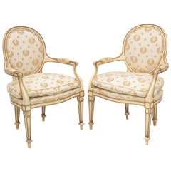 Paar bemalte und paketvergoldete italienische Sessel
