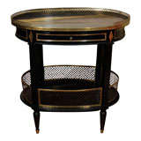A Pair Of French Gilt Bronze- Mounted Ebonized Side Tables