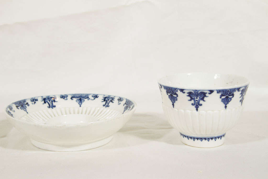 blue and white tea cups and saucers
