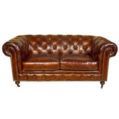A English Leather Chesterfield Sofa, Sette. One of Two 