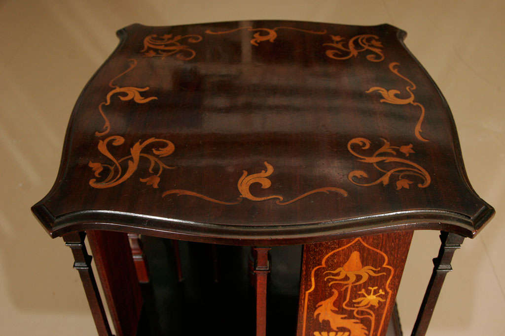 Red Walnut table top revolving Bookcase. 1