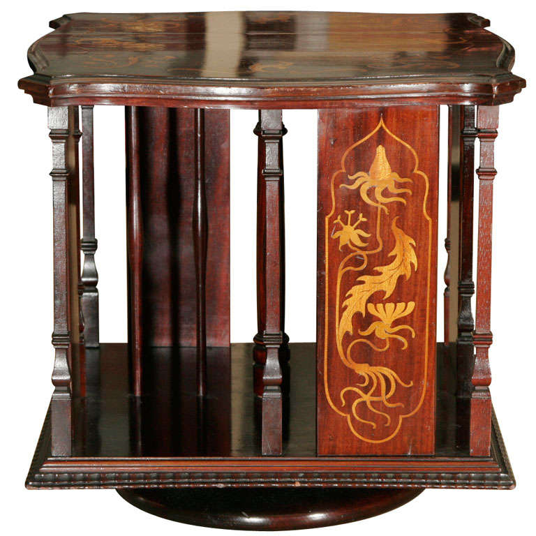 Red Walnut table top revolving Bookcase.