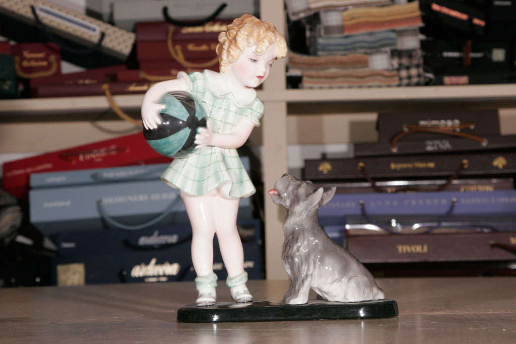 A Goldscheider Figure of a Girl with a terrier 2
