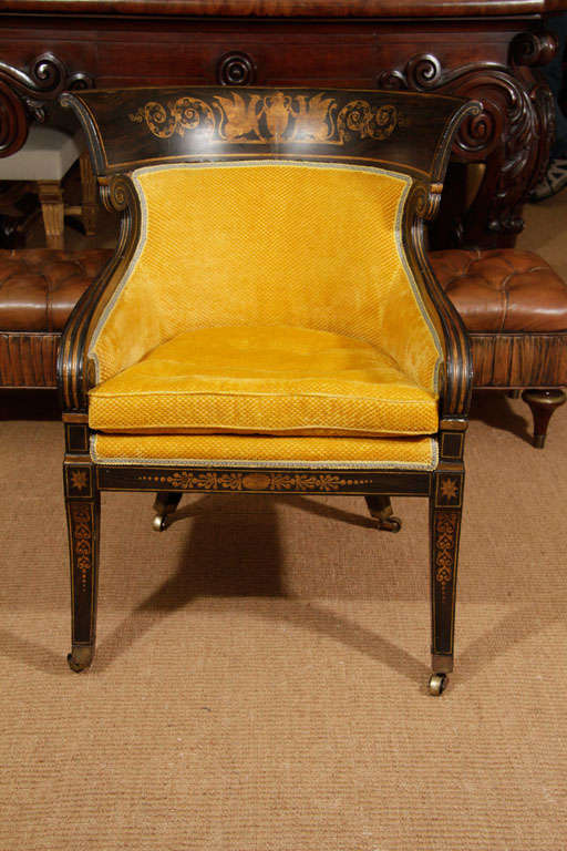 British A Pair of Regency Rosewood-Grained and Parcel-Gilt Bergeres