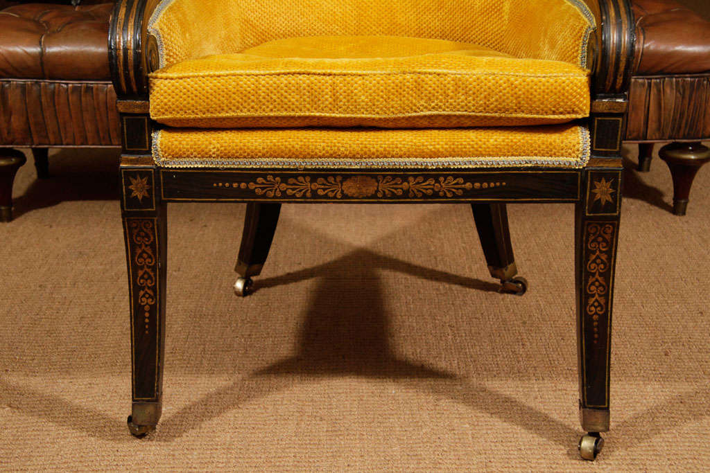 Wood A Pair of Regency Rosewood-Grained and Parcel-Gilt Bergeres