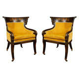 A Pair of Regency Rosewood-Grained and Parcel-Gilt Bergeres