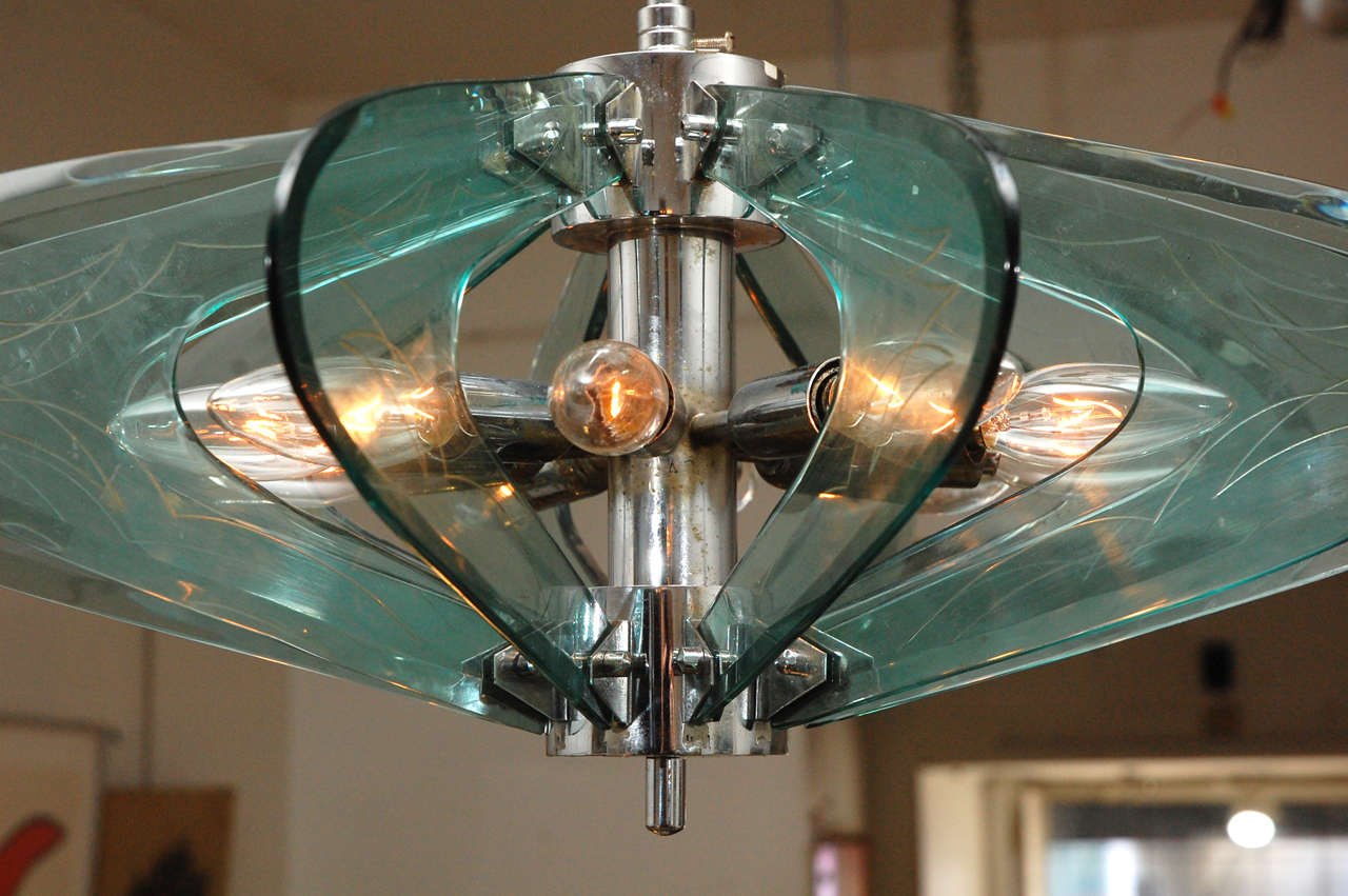 Mid-Century Modern Fontana Arte style Glass And Chrome Chandelier.
