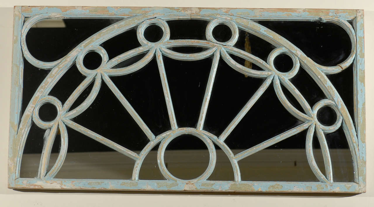 This is a wonderful 19th Century window frame with the original paint.  The frame was repurposed into a mirror.  The original turquoise paint is rubbed off in some areas.  This lends to the patina of the piece.  

Please visit our website for more