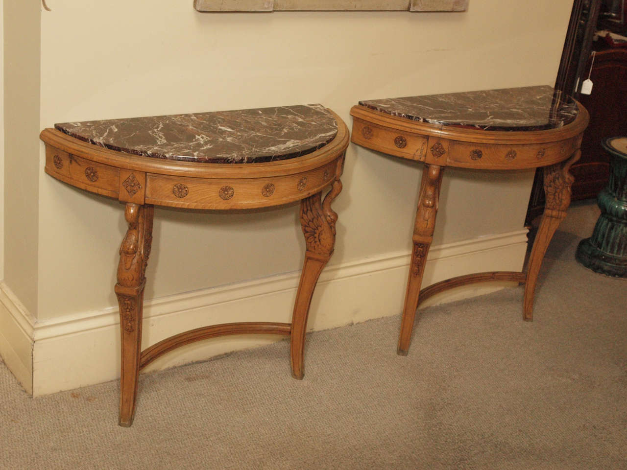 Pair of French walnut neoclassic marble-top consoles.