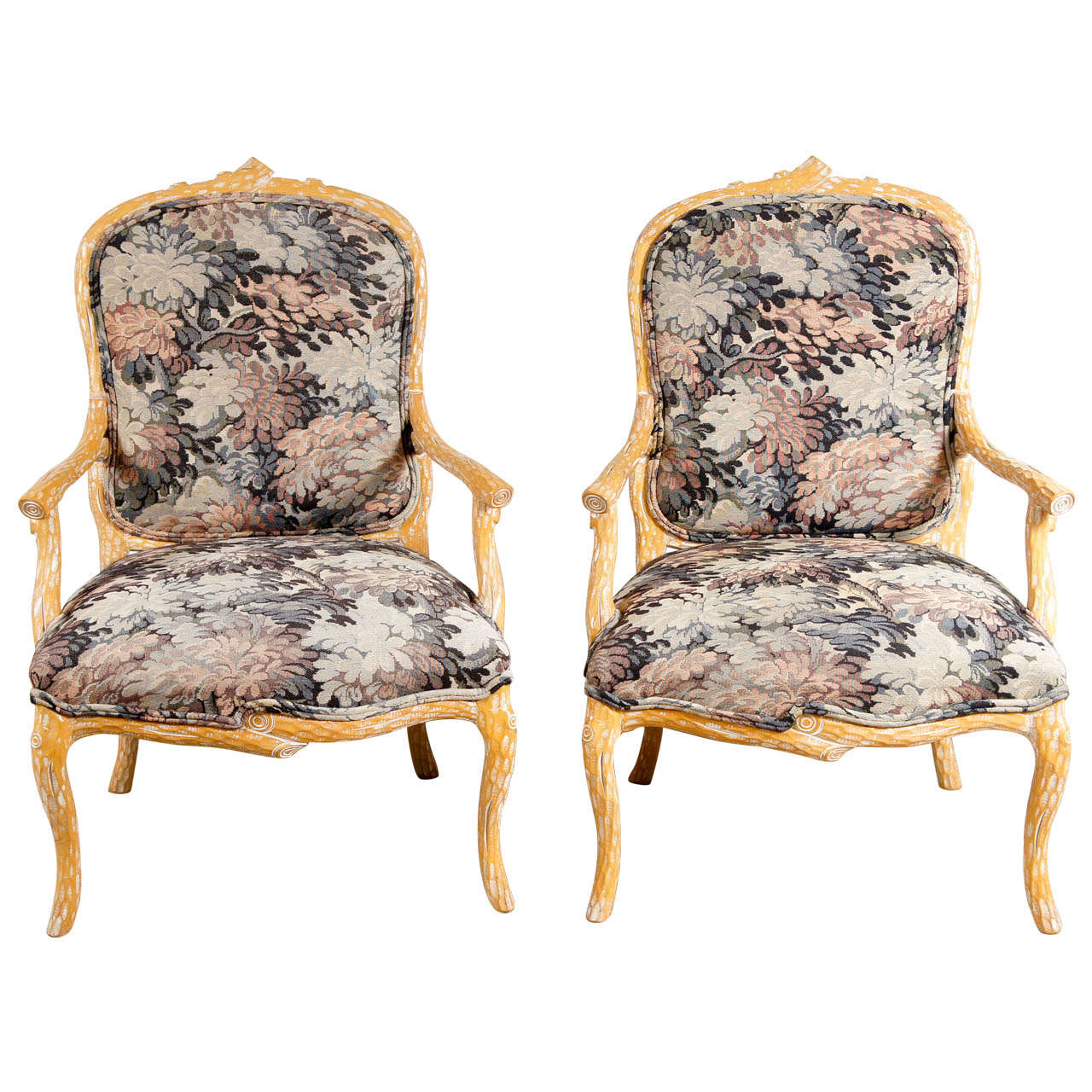 A Pair of Faux Bois Arm Chairs